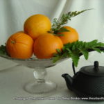 Oranges with teapot