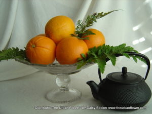 Oranges with teapot